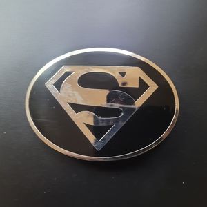 New Superman chrome shield oval belt buckle, approximately 3.5" x 2.5".